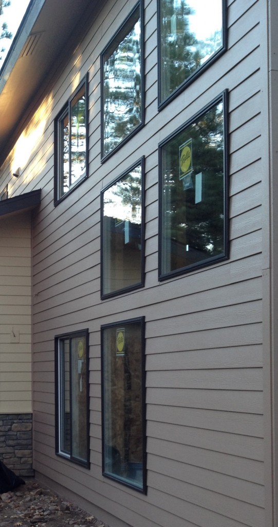 Windows with Hardie siding butting right up against the frame